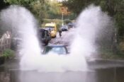 Honda CRV driving through floodwater too fast