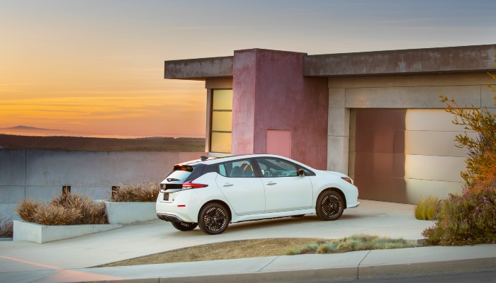 Nissan Leaf parked in driveway.