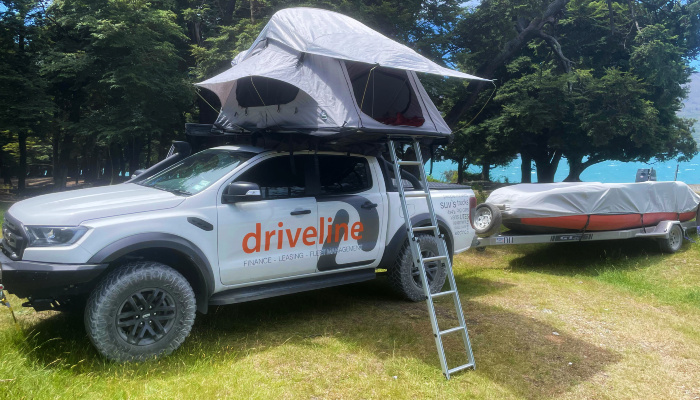 Lance Manins' Ford Ranger with rooftop tent and towing his inflatable jet boat