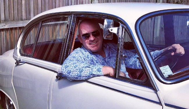 Blair Duncan in his classic Jaguar during lockdown, dreaming of cruising on the open road!