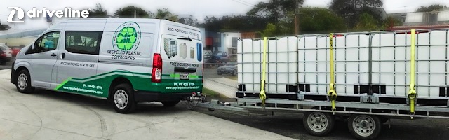 Recycled Plastic Containers Ltd Toyota Hiace van and flatbed trailer hauling 1,000L IBCs.